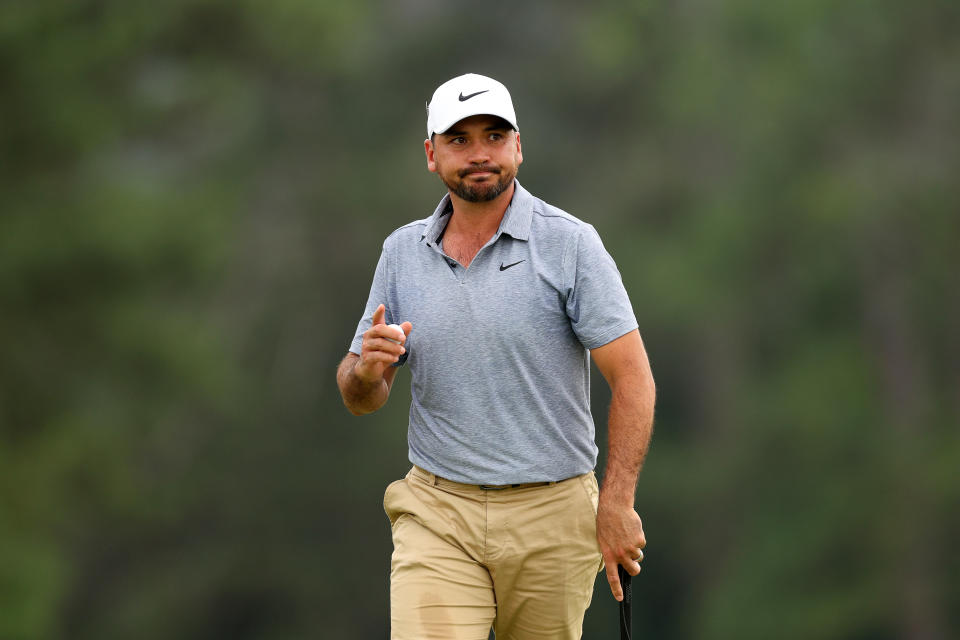 Seen here, Australia's Jason Day walks onto the 18th green during the first round of the 2023 Masters. 
