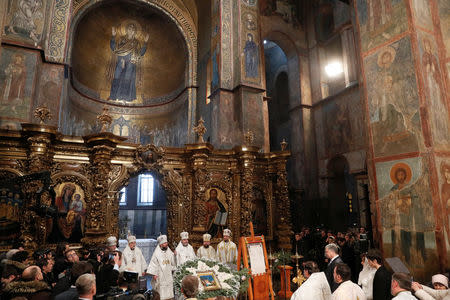 Clergymen and officials attend a service marking Orthodox Christmas and celebrating the independence of the Orthodox Church of Ukraine at the Saint Sophia's Cathedral in Kiev, Ukraine January 7, 2019. REUTERS/Valentyn Ogirenko