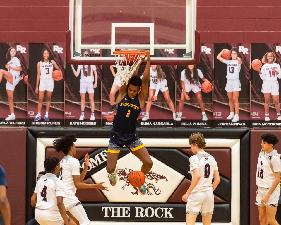 Junior forward Josiah Moseley, seen here dunking against Round Rock last season, made the All-Central Texas team in 2021-22. This year he is expected to be a team leader for a Stony Point basketball team that lost several players to graduation.