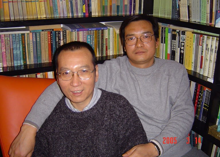 A file picture released by the family of Liu Xiaobo taken on March 14, 2005 shows 2010 Nobel peace laureate Liu Xiaobo, left, and his brother Liu Xiaoxuan