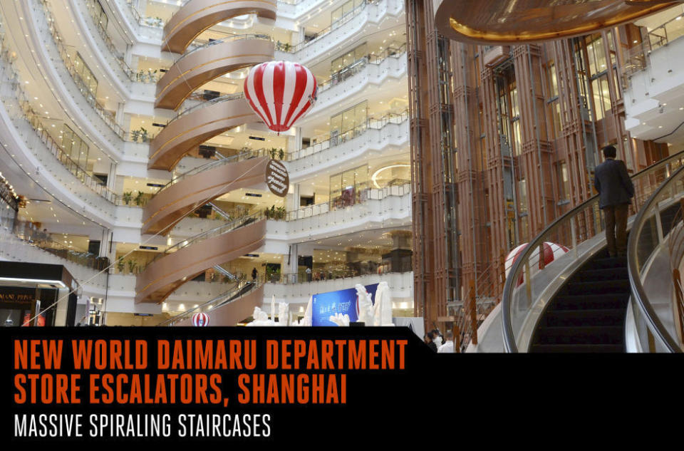 <p>The shape gets you on this one. Inside the New World Daimaru Department Store, a Shanghai shopping mall, 12 curved escalators fill the central atrium in the form of massive spiraling staircases. Mitsubishi built the project and raised the standard for out-there escalators.</p>