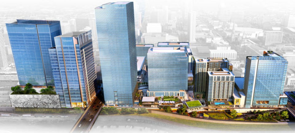 An architectural rendering of the Nashville Yards development. A row of skyscrapers front a park along the railroad tracks bordering the Gulch.