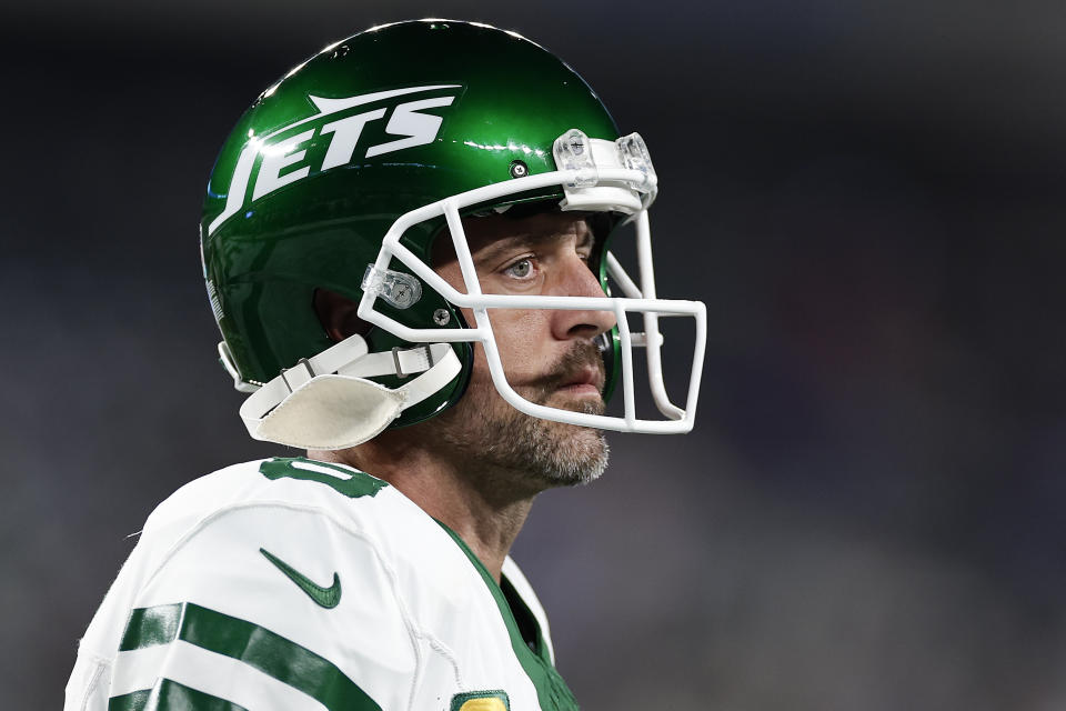 New York Jets quarterback Aaron Rodgers (8) warms up before playing against the Buffalo Bills in an NFL football game, Monday, Sept. 11, 2023, in East Rutherford, N.J. (AP Photo/Adam Hunger)