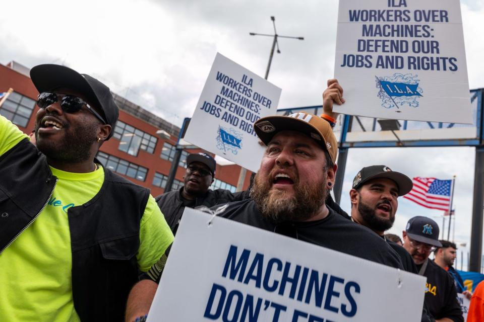 embattled new york city mayor eric adams stands with local striking dockworkers in red hook, brooklyn