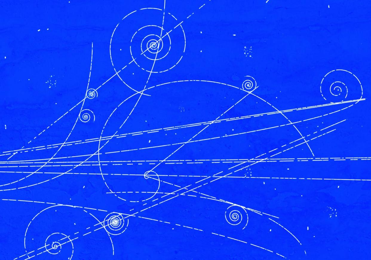 <span class="caption">Two new papers shed light on a longstanding mystery in particle physics.</span> <span class="attribution"><a class="link " href="https://www.gettyimages.com/detail/photo/particle-movement-in-a-bubble-chamber-royalty-free-image/157506583?adppopup=true" rel="nofollow noopener" target="_blank" data-ylk="slk:Zmeel/E+ via Getty Images;elm:context_link;itc:0;sec:content-canvas">Zmeel/E+ via Getty Images</a></span>