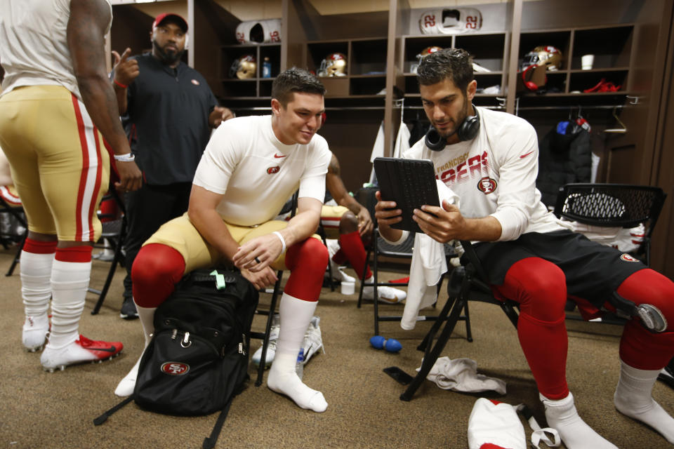 LANDOVER, MD - OCTOBER 20: Nick Mullens #4 and Jimmy Garoppolo #10 of the San Francisco 49ers relax in the locker room prior to the game against the Washington Redskins at FedExField on October 20, 2019 in Landover, Maryland. The 49ers defeated the Redskins 9-0. (Photo by Michael Zagaris/San Francisco 49ers/Getty Images)