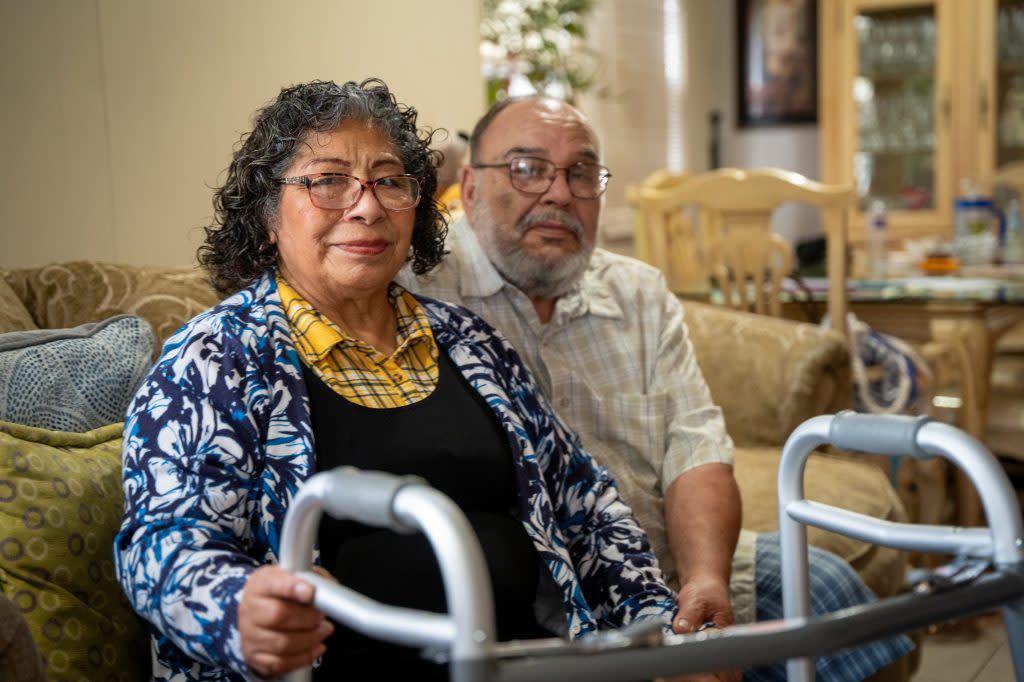 In the chaos of being shot at the Kansas City Chiefs Super Bowl parade, then hospitalized, Sarai Holguin lost her purse and cellphone. Her husband, Cesar, and daughter searched for her for about eight hours. (Christopher Smith for KFF Health News)