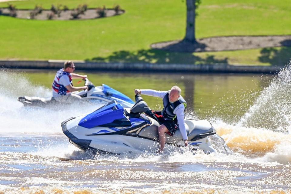 Macon-Bibb County Mayor Lester Miller rides a jet ski near Sandy Beach Park at Lake Tobesofkee Wednesday morning. Miller helped announce that the American Jet Sport Association will host a competition at the lake this weekend..