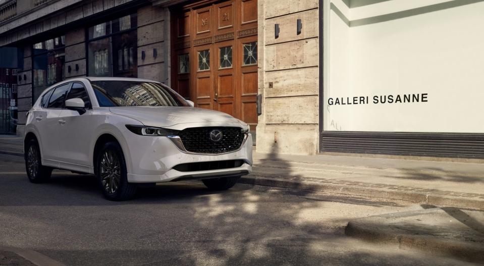 <p>The Mazda CX-5 impresses with its luxurious feel and affordable pricing. This Mazda offers more than just a comfortable, well-appointed ride, though, as the CX-5 is actually enjoyable to drive. Buyers can opt for either a 187-hp 2.5-liter I-4 or a 256-hp turbocharged 2.5-liter I-4, both of which mate to a six-speed automatic transmission. All-wheel-drive is standard across the line.</p><ul><li>Base price: $27,975</li><li>Max. EPA fuel economy (combined/city/highway): 26/24/30 mpg</li><li>All-wheel drive: Standard</li></ul><p><a class="link " href="https://www.caranddriver.com/mazda/cx-5" rel="nofollow noopener" target="_blank" data-ylk="slk:MORE ABOUT THE MAZDA CX-5;elm:context_link;itc:0;sec:content-canvas">MORE ABOUT THE MAZDA CX-5</a></p>