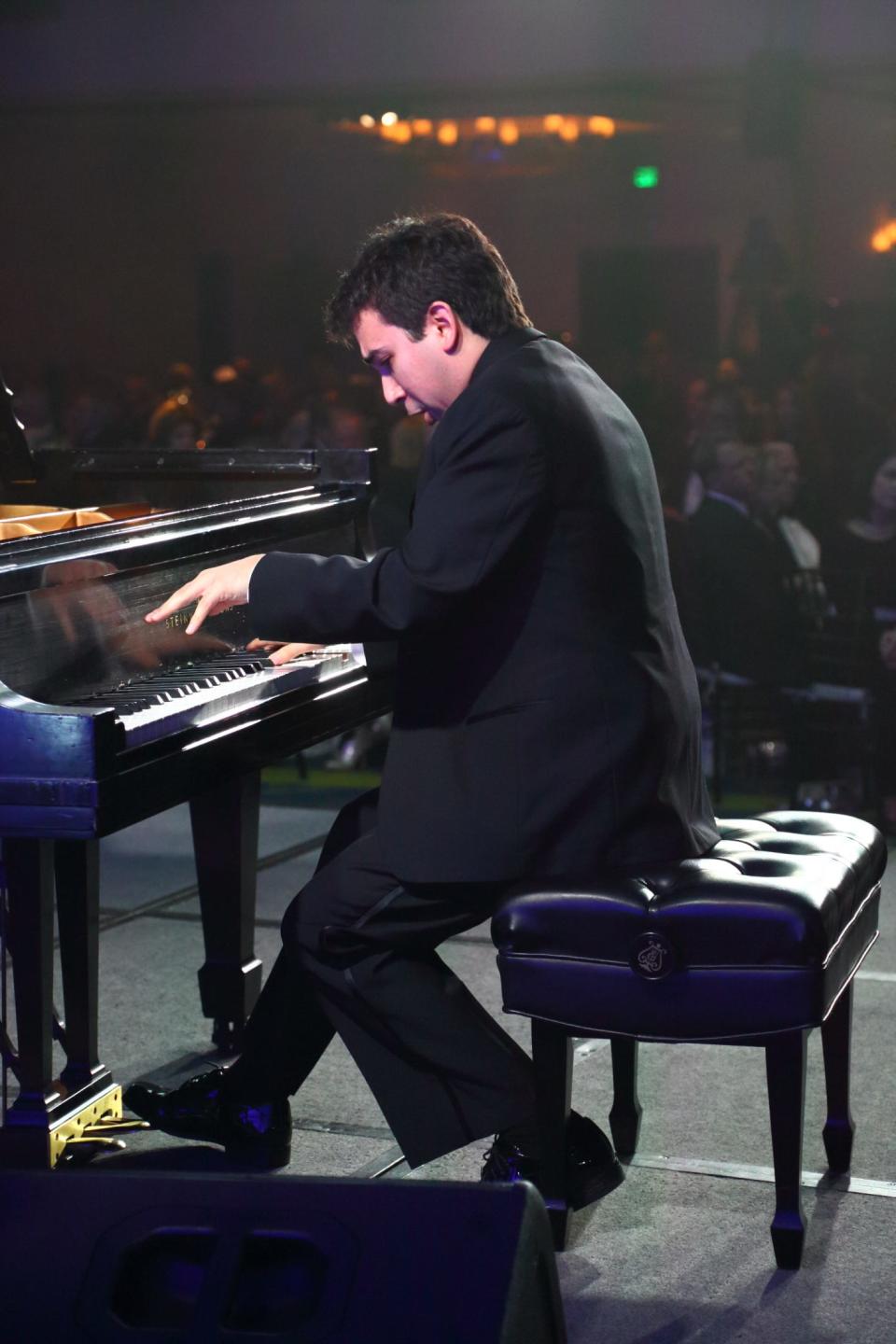 Scott Cuellar competes at a piano competition around 2013. Today, Cuellar teaches applied piano as well as other keyboard-related courses at the Syracuse University Setnor School of Music.