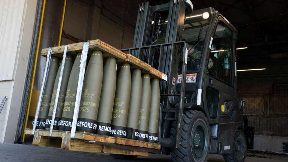 Airmen with the 436th Aerial Port Squadron use a forklift to move 155 mm shells ultimately bound for Ukraine, on April 29, 2022, at Dover Air Force Base in Delaware. - Alex Brandon/AP