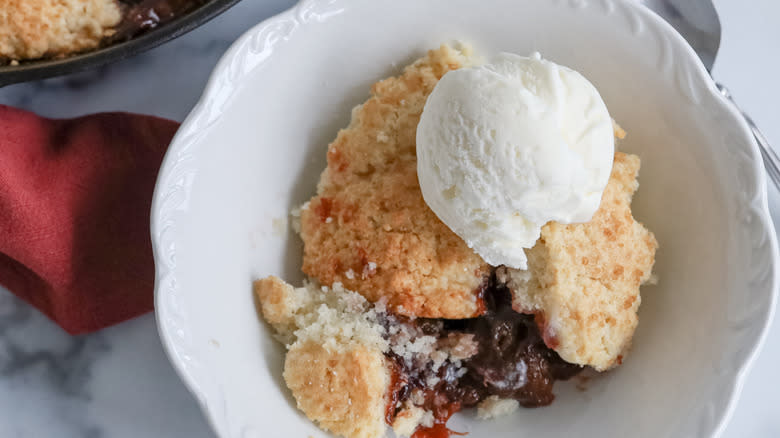 plum cobbler with ice cream