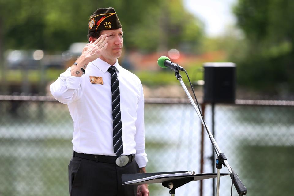 Portsmouth City Councilor and Army veteran Josh Denton leads the Portsmouth Burial at Sea ceremony at Prescott Park on Friday, May 27, 2022.