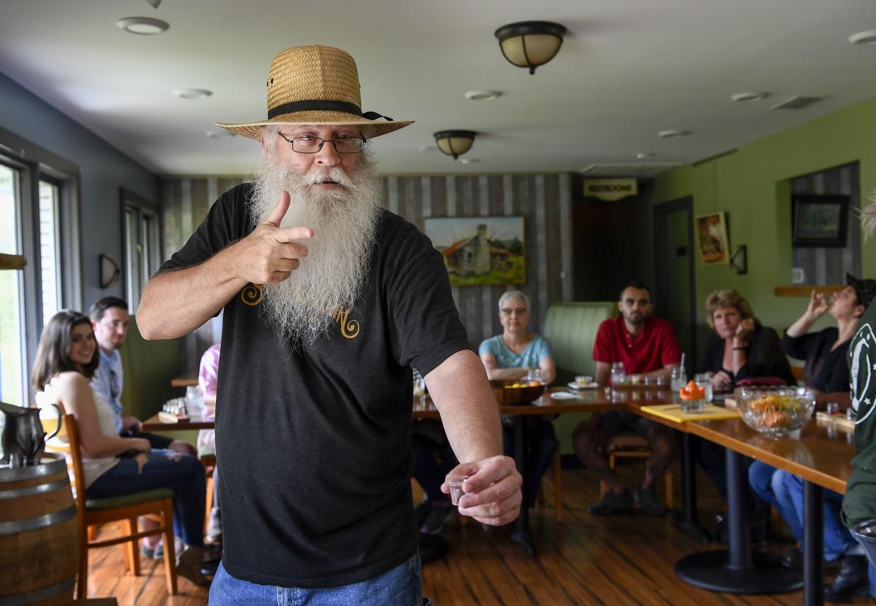 Tour guide Jeff Schuler tells stories about how bootleggers made people drink at gunpoint during the cocktail making class at the Short Mountain Distillery on April 14, 2017, in Woodbury, Tenn.
