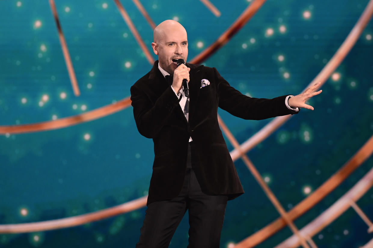 From Lifted Entertainment

THE ROYAL VARIETY PERFORMANCE 2023
Sunday 17th December 8pm on ITV1 and ITVX

Pictured: Comedian Tom Allen on stage at the Royal Albert Hall for the Royal Variety Performance 2023 

Bradley Walsh to host this yearâ€™s Royal Variety Performance at The Royal Albert Hall in London with performances from Cher, a very special celebration of 100 years of Disney & BGT winner Viggo Venn

Award-winning and esteemed entertainer, actor and presenter Bradley Walsh is to host The Royal Variety Performance 2023 from the magnificent Royal Albert Hall in London, in the presence of members of the Royal Family.

This annual event will be a spectacular evening featuring international stars, world class theatre, sensational singers and hilarious comedy.

Our headliners this year will be multi-award winning, legendary superstar Cher who will be making a very special appearance to perform a number from her wonderful new Christmas album. 

And an exclusive 100th Anniversary celebration from Disney Theatrical, showcasing an astounding medley, featuring performances from the casts of The Lion King, Frozen, Aladdin, Hercules and Beauty & The Beast.

Stars lined up to appear are pop rock band McFly who are celebrating their 20th Anniversary, Glastonbury favourite and much loved singer Rick Astley, pop sensation Zara Larsson, Paloma Faith performing her latest single and the phenomenal Hannah Waddingham who will be accompanied by the ENO chorus.

There will also be a beautiful collaboration from the outstanding world class pianist Lang Lang who will be joined by fourteen year-old Lucy, the incredible winner of Channel 4â€™s The Piano. As well as music from Melanie C who will be performing a very special tribute to theatre producer Bill Kenwright.

Also taking to the stage are the cast from the uplifting and ground breaking new West End musical The Little Big Things.  An extraordinary and inspirational true life story.

The evening will also feature the outstanding West End casts from Crazy For You, the award winning and vocal powerhouse Beverley Knight with the cast of Sister Act, the thrilling Argentinian dancing troupe Malevo, a magical performance from Derren Brownâ€™s West End creation Unbelievable and Simon Cowell will introduce Britainâ€™s Got Talent winner comedian Viggo Venn. Plus, world class stand-up from the brilliant Tom Allen, Rosie Jones, Ellie Taylor and Simon Brodkin.

The National Anthem will be led by The Fanfare Trumpeters of The Band of the Welsh Guards and the National Youth Choir.


(C)  ITV

For further information please contact Peter Gray
Mob 07831460662 /  peter.gray@itv.com

This photograph is (C) *** and can only be reproduced for editorial purposes directly in connection with the programme or event mentioned herein.

Once made available by ITV plc Picture Desk, this photograph can be reproduced once only up until the transmission [TX] date and no reproduction fee will be charged.

Any subsequent usage may incur a fee.

This photograph must not be manipulated [excluding basic cropping] in a manner which alters the visual appearance of the person photographed deemed detrimental or inappropriate by ITV plc Picture Desk.

This photograph must not be syndicated to any other company, publication or website, or permanently archived, without the express written permission of ITV Picture Desk.

Full Terms and conditions are available on the website www.itv.com/presscentre/itvpictures/terms
