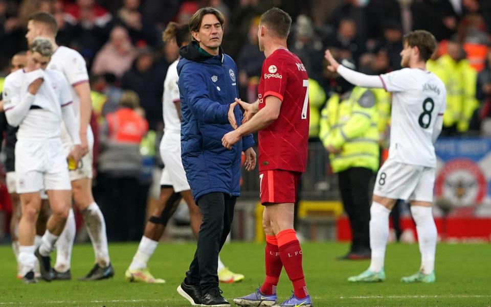 Brentford manager Thomas Frank shakes hands with Liverpool's James Milner at full time - Peter Byrne/PA Wire