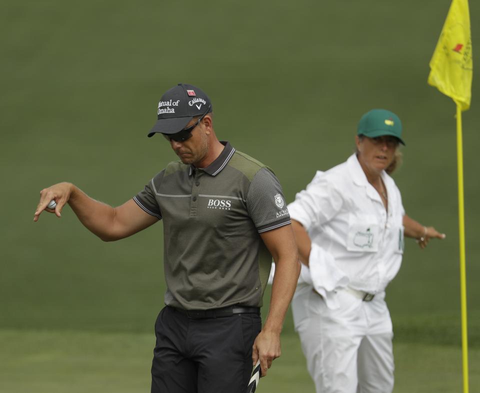 Henrik Stenson, of Sweden, reacts to his putt on the second hole during the first round for the Masters golf tournament Thursday, April 11, 2019, in Augusta, Ga. (AP Photo/Chris Carlson)