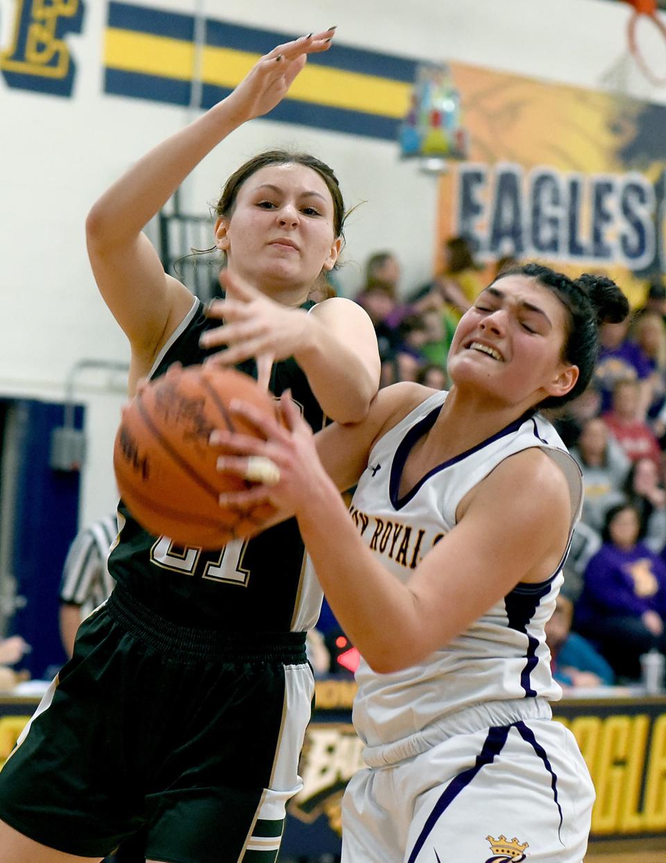 Blissfield's Elizabeth Welsh and Natalie LaPrad of St. Mary Catholic Central battle for the ball during Blissfield's 51-38 victory in the finals of the Division 3 District at Erie Mason on Friday, March 8, 2024.