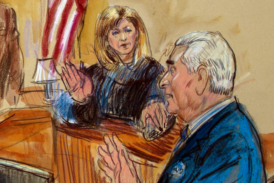 This courtroom sketch shows former campaign adviser for President Donald Trump, Roger Stone talking from the witness stand as Judge Amy Berman Jackson listens during a court hearing at the U.S. District Courthouse in Washington, Thursday, Feb. 21, 2019. Berman Jackson issued a broad gag order forbidding Stone to discuss his criminal case with anyone and gave him a stinging reprimand over his posting of a photo of the judge with what appeared to be crosshairs of a gun. (Dana Verkouteren via AP)