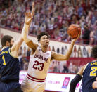 Indiana forward Trayce Jackson-Davis (23) drives to the basket during the second half of an NCAA college basketball game against Michigan, Saturday, Feb. 27, 2021, in Bloomington, Ind. (AP Photo/Doug McSchooler)