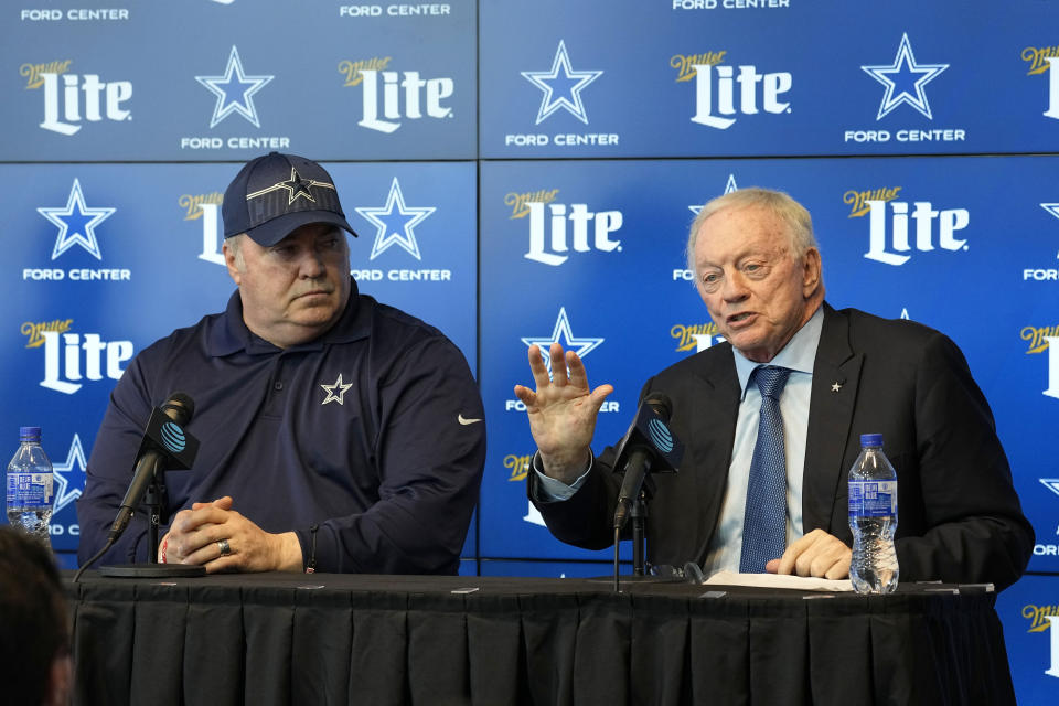 Dallas Cowboys head coach Mike McCarthy, left, listens as team owner Jerry Jones responds to questions during a news conference at the NFL football team's headquarters, Monday, April 24, 2023, in Frisco, Texas. (AP Photo/Tony Gutierrez)