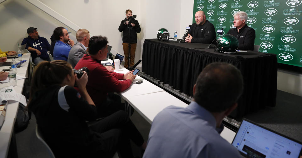 New York Jets general manager Joe Douglas and assistant general manager Rex Hogan, answer questions from reporters during an NFL football pre-draft press conference on Tuesday, April 25, 2023, in Florham Park,N.J. (AP Photo/Noah K. Murray)