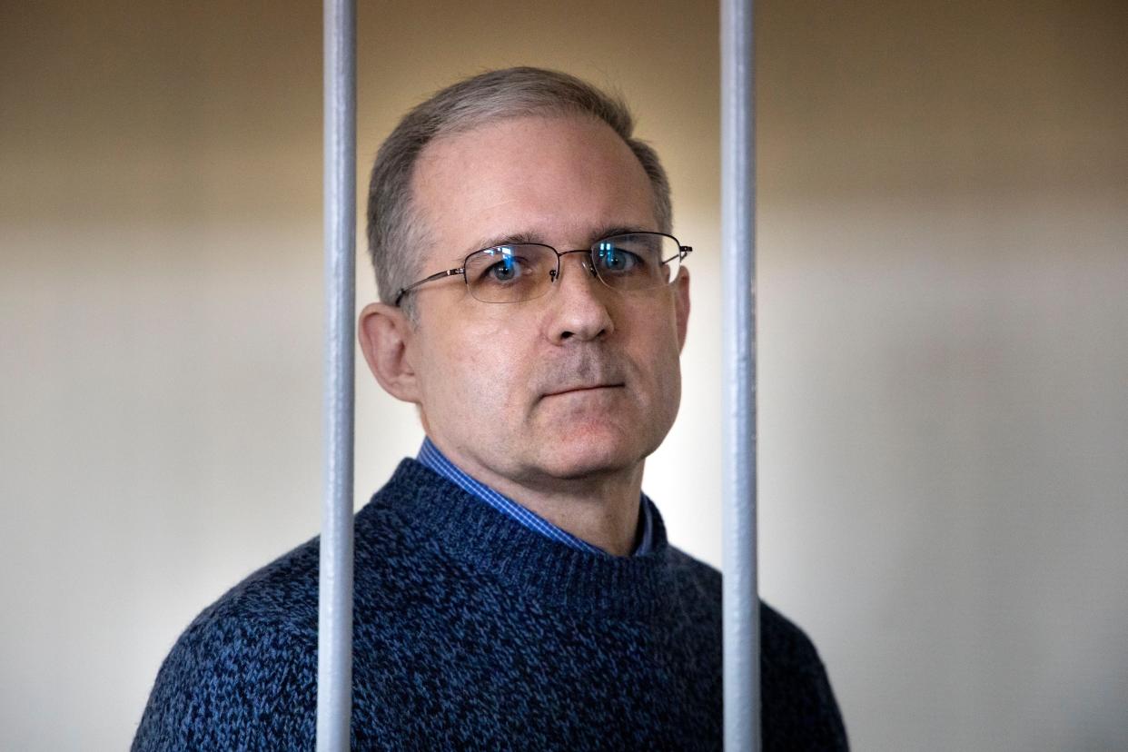 FILE- In this Aug. 23, 2019, file photo, Paul Whelan, a former U.S. marine who was arrested for alleged spying in Moscow on Dec. 28, 2018, speaks while standing in a cage as he waits for a hearing in a courtroom in Moscow, Russia. Viktor Bout, the Russian arms dealer who once inspired a Hollywood movie, is back in the headlines with speculation around a return to Moscow in a prisoner exchange for WBNA star Brittney Griner and Whelan. (AP Photo/Alexander Zemlianichenko, File)