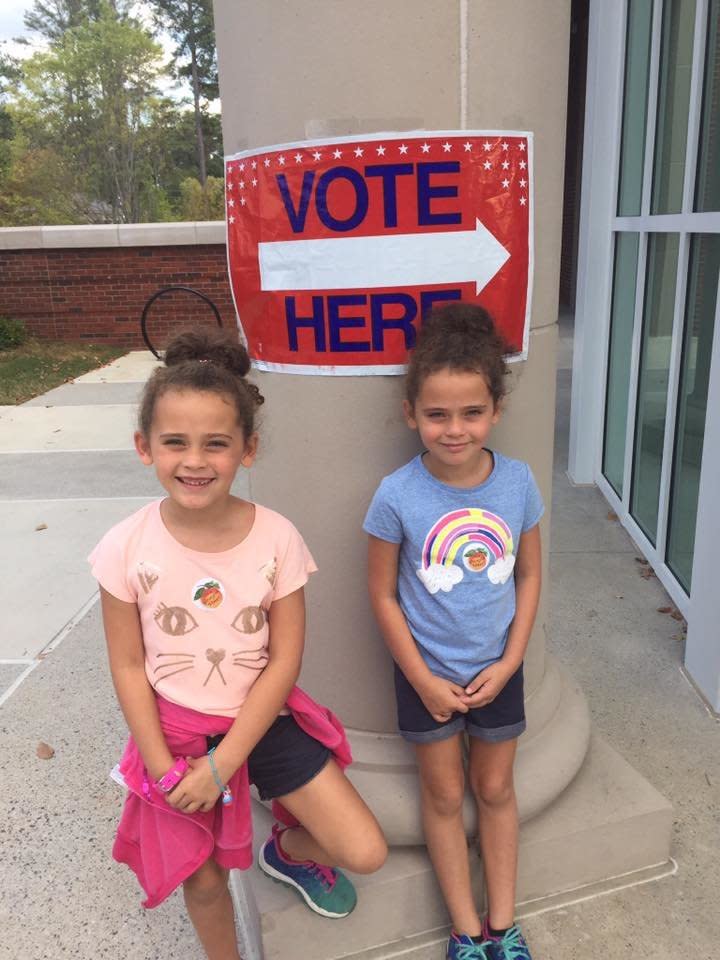 Early voters. I've taken my twins to vote each November. Want them to know how important it is.