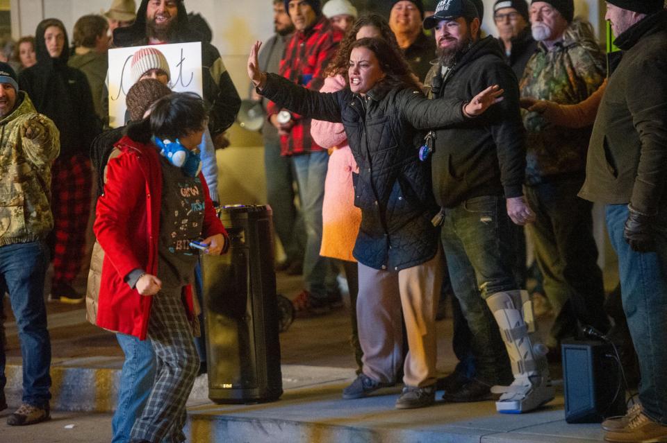 A protester and counterprotester get into a confrontation during the "A Drag Queen Christmas" demonstration outside the Tennessee Theatre on Dec. 22.