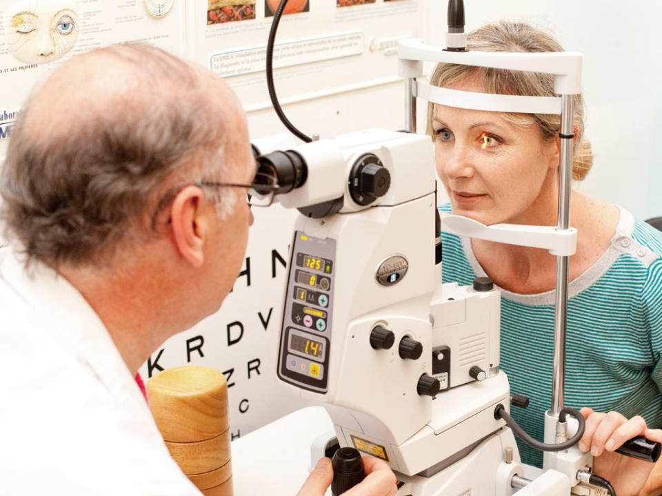 A patient receives an eye examination (file photo): Rex Features