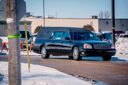 The procession departs after funeral services for radio broadcaster Tyler Bieber, one of the people killed in the crash of a bus carrying the Humboldt Broncos Junior A hockey team, in Humboldt, Saskatchewan, Canada April 12, 2018. REUTERS/Matt Smith