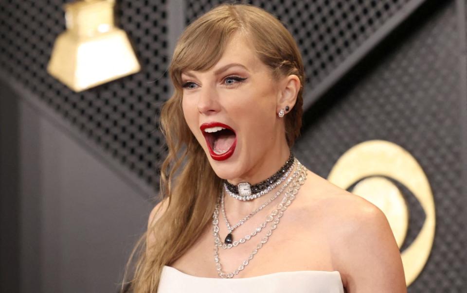 Taylor Swift did not laugh when comedian Jo Koy made a crack about her during the Golden Globes Awards. REUTERS