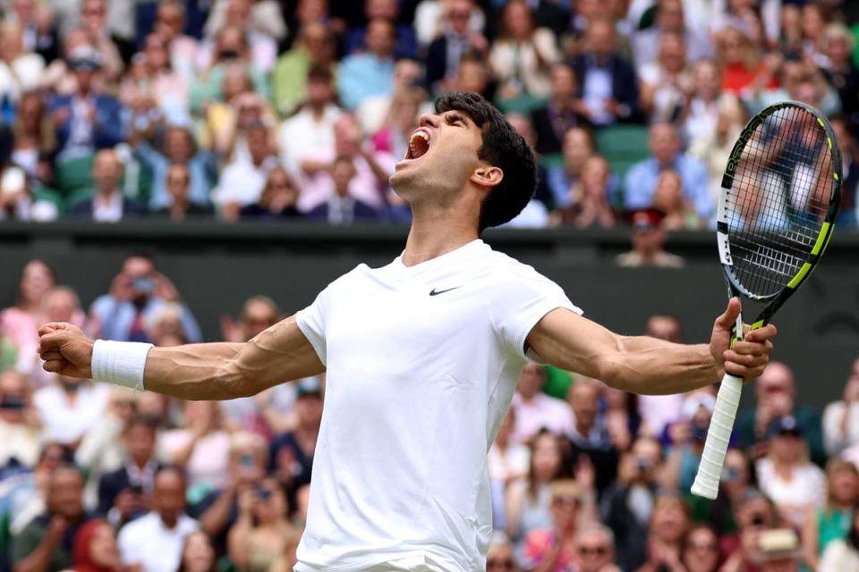 The defending champion celebrates sealing his spot in Sunday’s final (Getty Images)