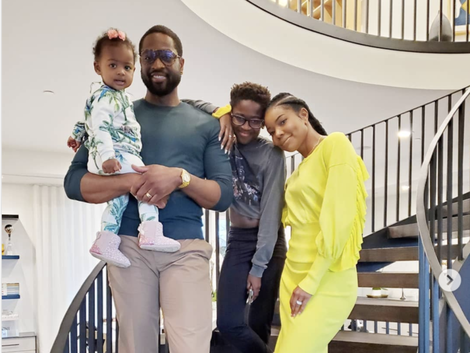 Zaya Wade, 12 (center), pictured with her NBA-star father Dwyane Wade, his wife Gabrielle Union and the couple's baby girl Kaavia, has recently begun using pronouns "she" and "her." (Screenshot: Instagram/GabUnion)