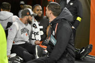 Cleveland Browns linebacker Anthony Walker Jr., center, is taken from the field after being injured during the second half of an NFL football game against the Pittsburgh Steelers in Cleveland, Thursday, Sept. 22, 2022. (AP Photo/David Richard)