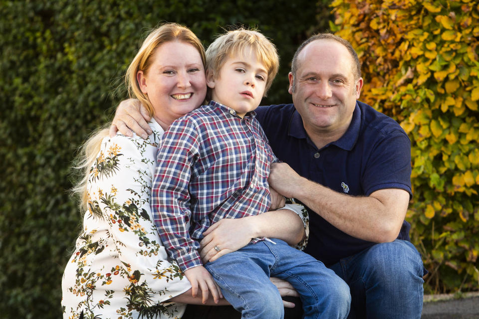 PIC BY CATERS NEWS (PICTURED Childhood dementia sufferer Harley Bond with his parents Wanye Bond and Emma Siddal) A little boy who had forgotten his parents after suffering from a rare type of childhood dementia can now recognise them again - after he has begun a pioneering medical trial that implanted a chip in his head. Little Harley Bond, five, was diagnosed with Sanfilippo syndrome when he was three years old, a rare type of dementia that causes permanent brain damage. His parents Wayne Bond, 47, and Emma Siddal, 38, from Sheffield, were heartbroken when Harley lost the ability to recognise them and stopped saying 'mummy' and 'daddy'. SEE CATERS COPY