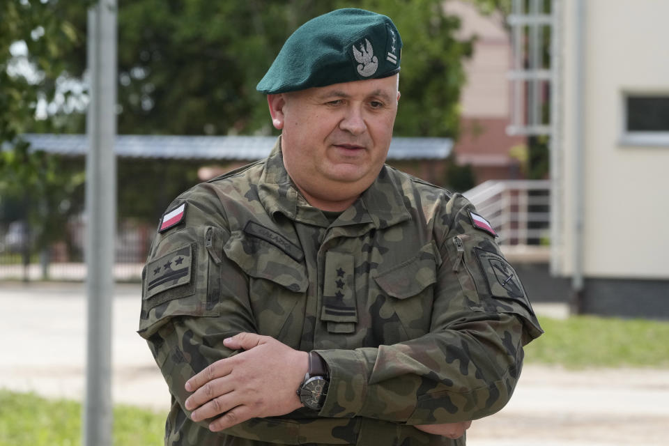 Col. Pawel Galazka, Commander of the 18th Logistics Regiment speaks to The Associated Press in Lomza, Poland, on Thursday June 20, 2024. Galazka's regiment is overseeing training of volunteers taking part in summer training program called "Holidays with the Army." Despite the name, it is actually rigorous basic training in combat, shooting and other skills as Poland seeks for new recruits for its growing army, mindful of Russia's revived imperial ambitions. (AP Photo/Czarek Sokolowski)