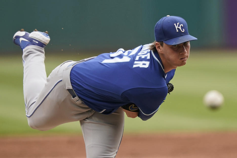 Kansas City Royals starting pitcher Brady Singer delivers in the first inning in the first baseball game of a doubleheader against the Cleveland Indians, Monday, Sept. 20, 2021, in Cleveland. (AP Photo/Tony Dejak)