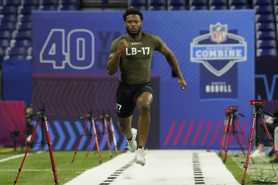 Nebraska linebacker Ochaun Mathis runs a drill at the NFL football scouting combine in Indianapolis, Thursday, March 2, 2023. (AP Photo/Erin Hooley)