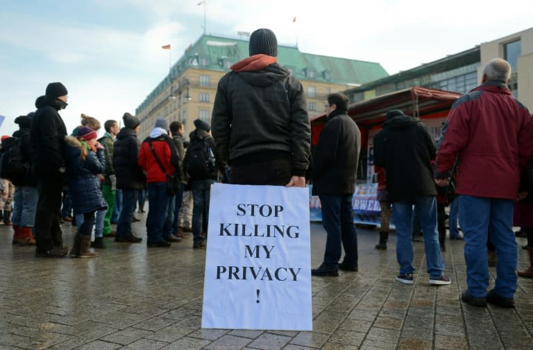 Demonstrators protest against data preservation in front of the US embassy in Berlin on February 1, 2014