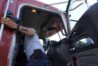 A truck is driven into a rally on a bridge in Minneapolis