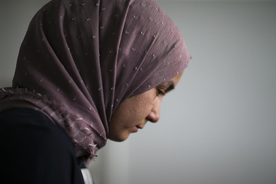 Uyghur Nursimangul Abdureshid, 34, reacts during an interview with The Associated Press in Istanbul, Turkey on May 4, 2022. Nearly one in 25 people in a county in the Uyghur heartland of China has been sentenced to prison on terrorism-related charges, in what is the highest known imprisonment rate in the world, an Associated Press review of leaked data shows. Abdureshid's brother, Memetali Abdureshid, who ran a car repair shop, was listed as being sentenced to 15 years and 11 months in prison on charges of "picking quarrels and provoking trouble” and “preparing to carry out terrorist activities." (AP Photo/Emrah Gurel)