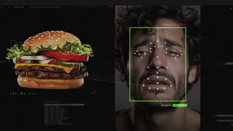 A burger next to a man's face being analyzed by facial recongition 