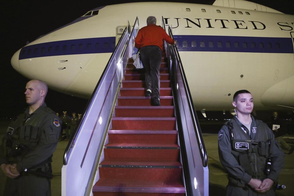 U.S. Secretary of Defense Chuck Hagel boards his plane at the Andrews Air Force Base in Camp Springs, Maryland