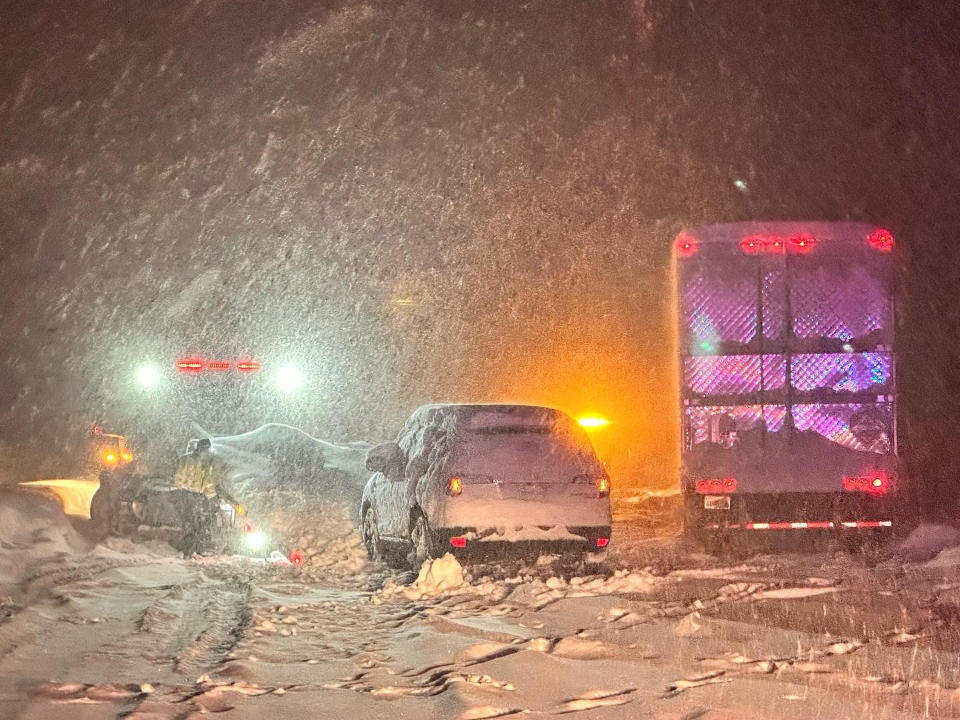 This image taken Saturday, Dec 31, 2022 and released by California Highway Patrol Truckee, vehicles stranded are stranded along Interstate 80 at the Nevada State line and Colfax, Calif. Driving conditions are dangerous and treacherous, travel is not advised. There are dozens and dozens of vehicles stuck on the freeway and county roads, and we are responding to calls as Calif. California was drying out and digging out on New Year's Day after a powerful storm brought drenching rain or heavy snowfall to much of the state, snarling traffic and closing highways. (California Highway Patrol Truckee via AP)