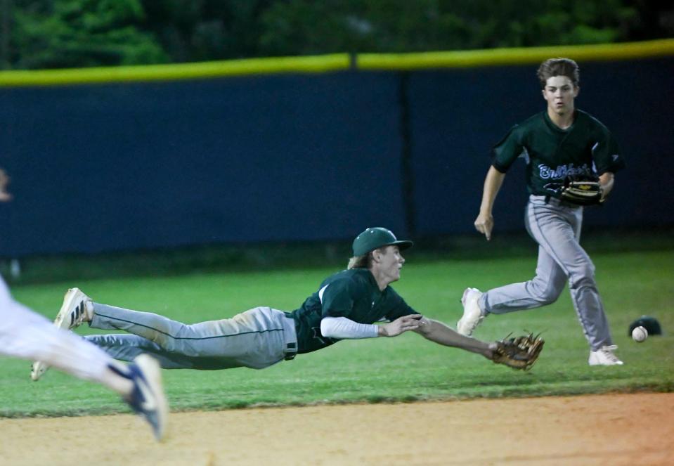 Gavin Ziegler of Melbourne dives for a ball during the game against Eau Gallie Wednesday night, March 30, 2022. Craig Bailey/FLORIDA TODAY via USA TODAY NETWORK