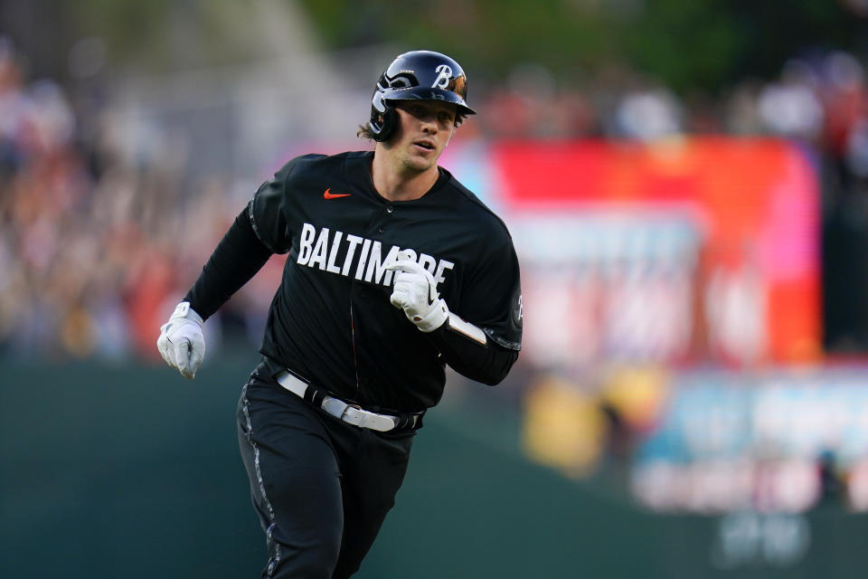 Baltimore Orioles' Adley Rutschman runs the bases after hitting a solo home run off Texas Rangers starting pitcher Jon Gray during the first inning of a baseball game, Friday, May 26, 2023, in Baltimore. (AP Photo/Julio Cortez)