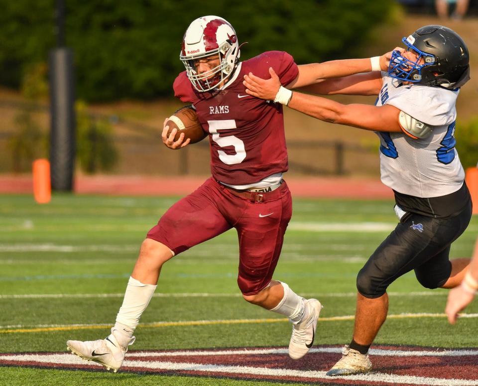 Northbridge quarterback Joel LaChapelle runs the ball against West Boylston Friday.