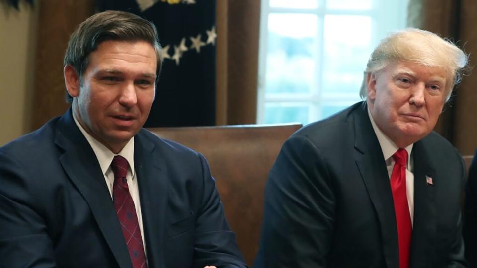 Florida Gov. Ron DeSantis (left) and Donald Trump, former president and current candidate for the GOP presidential nomination are seen in 2018 at the White House. Democratic candidate Marianne Williamson says “Ron DeSantis does not scare me any less than Donald Trump, in terms of the actual fascist ideas he has about Florida.” (Photo: Mark Wilson/Getty Images)