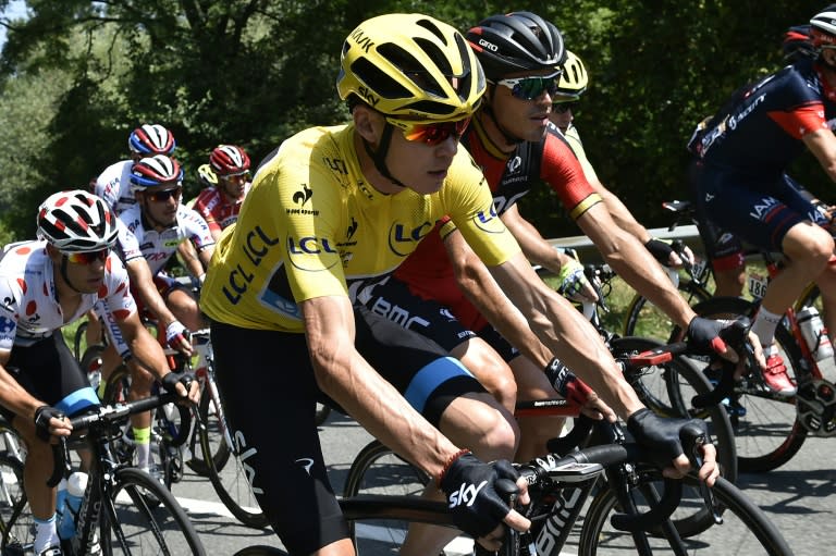 Britain's Christopher Froome (C) rides in the pack during the 11th stage of the Tour de France on July 15, 2015, between Pau and Cauterets, southwestern France